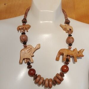 Hand Crafted Black and brown wooden bead necklace with elephants. Length 14 inch